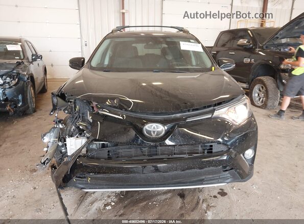 2T3RFREV8JW732159 2018 TOYOTA RAV4 Black Instrument cluster view