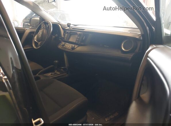 2T3RFREV8JW732159 2018 TOYOTA RAV4 Black Front interior view
