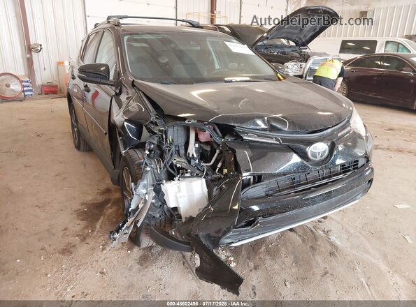 2T3RFREV8JW732159 2018 TOYOTA RAV4 Black Front view