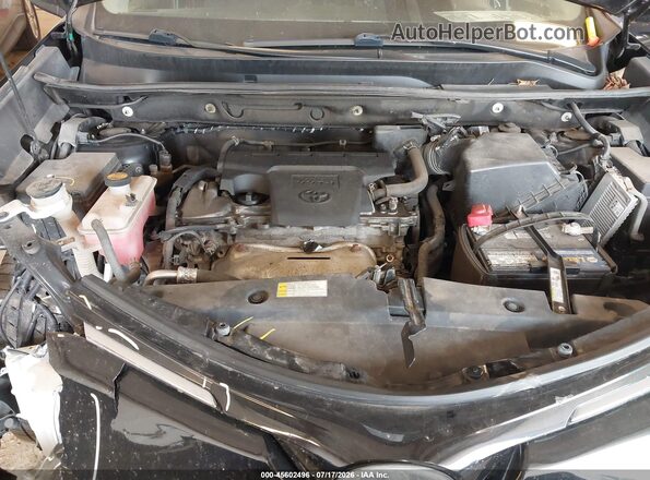 2T3RFREV8JW732159 2018 TOYOTA RAV4 Black Rear view