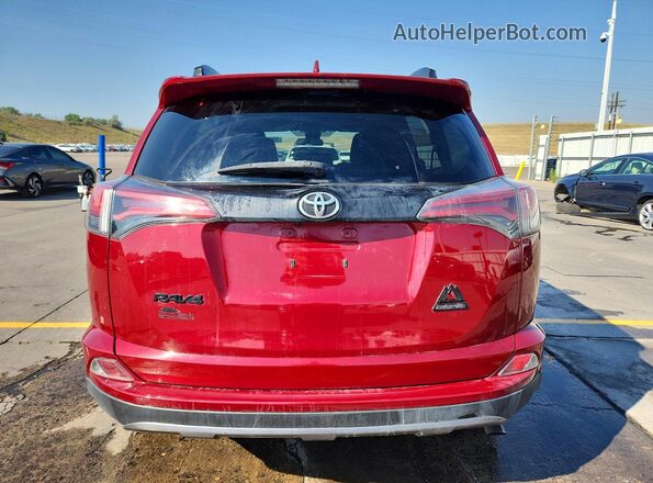2T3RFREV8JW732307 2018 TOYOTA RAV4 Burgundy Rear view