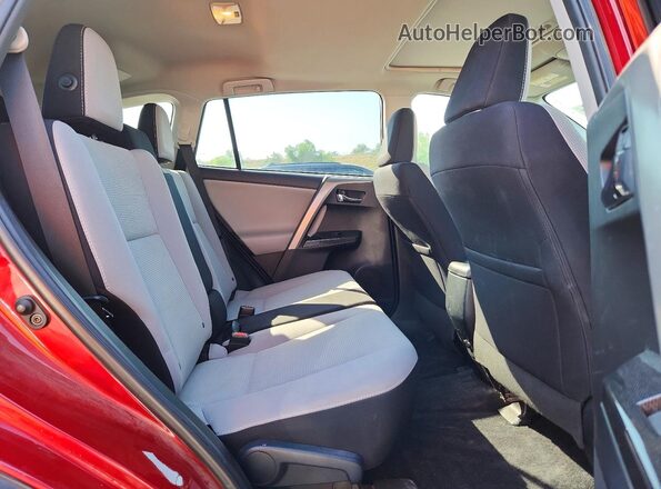 2T3RFREV8JW732307 2018 TOYOTA RAV4 Burgundy Rear interior view