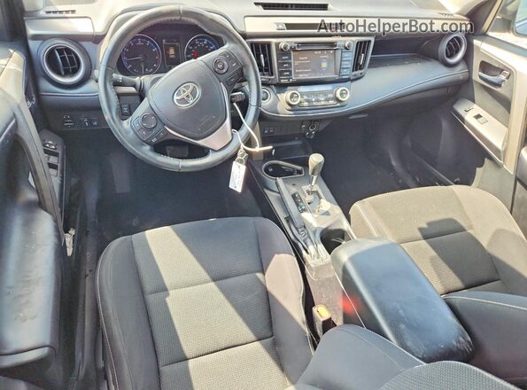 2T3RFREV8JW771608 2018 TOYOTA RAV4 Purple Dashboard view