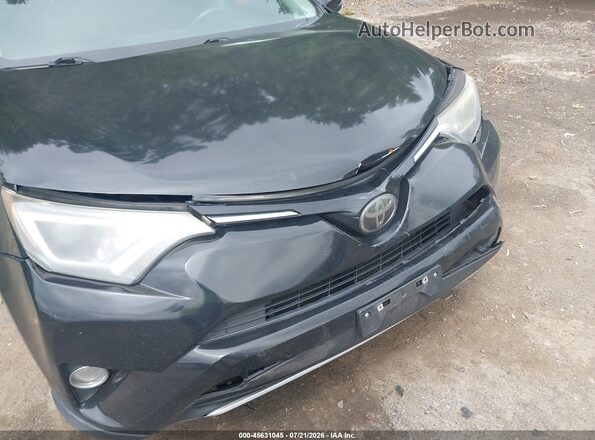 2T3RFREV8JW788974 2018 TOYOTA RAV4 Black 