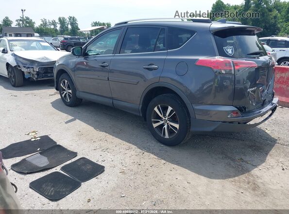 2T3RFREV8JW831032 2018 TOYOTA RAV4 Gray Trasero izquierdo