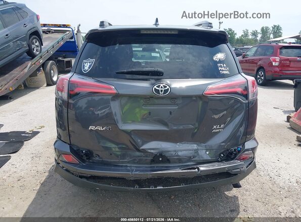 2T3RFREV8JW831032 2018 TOYOTA RAV4 Gray Vista frontal