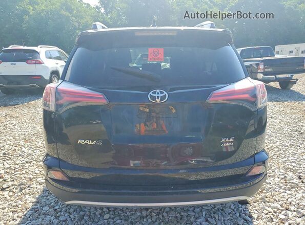 2T3RFREV9GW459869 2016 TOYOTA RAV4 Black Widok z tyłu