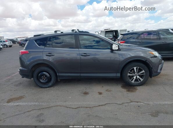 2T3RFREV9GW467227 2016 TOYOTA RAV4 Gray Vista interior trasera