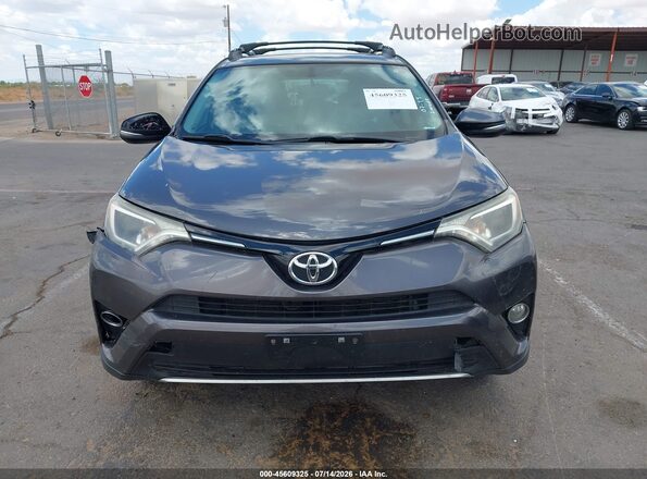 2T3RFREV9GW467227 2016 TOYOTA RAV4 Gray Vista del cuadro de instrumentos