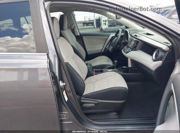2T3RFREV9GW467227 2016 TOYOTA RAV4 Gray Vista interior delantera