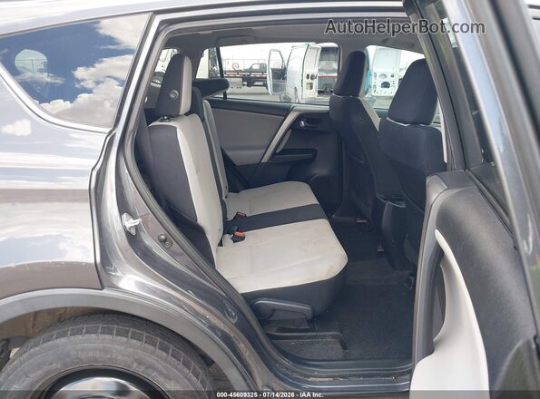 2T3RFREV9GW467227 2016 TOYOTA RAV4 Gray Vista de la etiqueta del VIN
