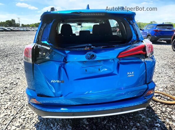 2T3RFREV9GW472587 2016 TOYOTA RAV4 Blue Rear view