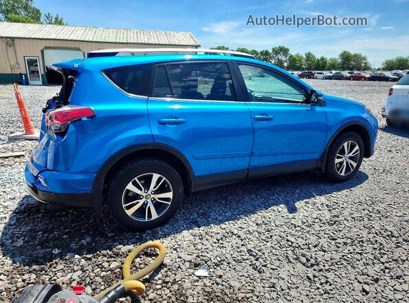 2T3RFREV9GW472587 2016 TOYOTA RAV4 Blue Rear right