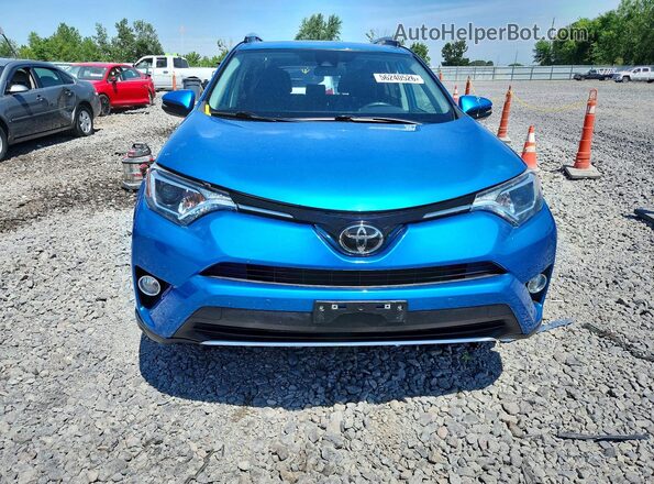 2T3RFREV9GW472587 2016 TOYOTA RAV4 Blue Front view