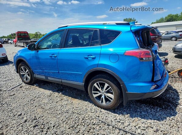 2T3RFREV9GW472587 2016 TOYOTA RAV4 Blue Rear left
