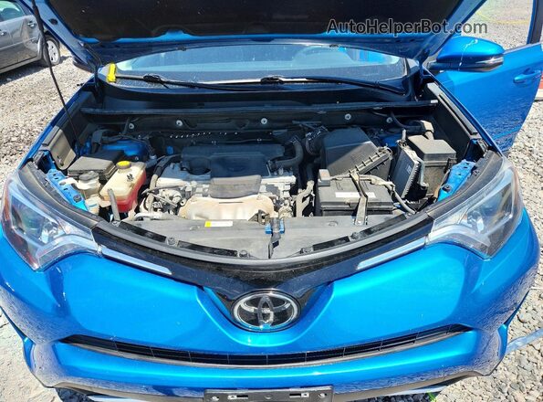 2T3RFREV9GW472587 2016 TOYOTA RAV4 Blue Rear interior view