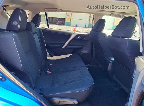 2T3RFREV9GW472587 2016 TOYOTA RAV4 Blue Rear seats view