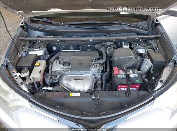2T3RFREV9GW474615 2016 TOYOTA RAV4 Gray Rear view