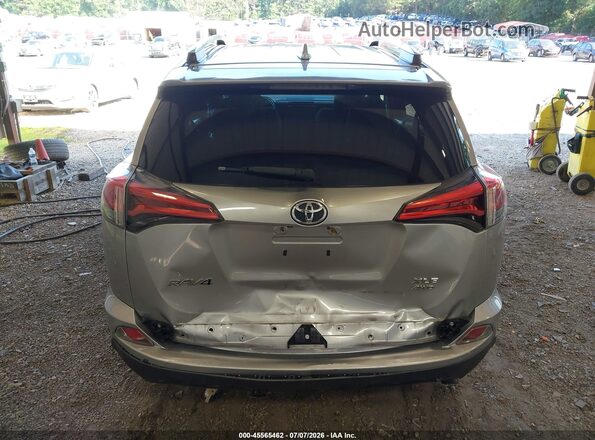 2T3RFREV9GW474615 2016 TOYOTA RAV4 Gray Front view