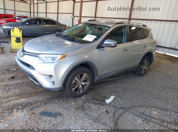 2T3RFREV9GW474615 2016 TOYOTA RAV4 Gray Front left