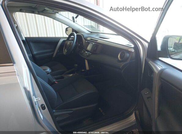 2T3RFREV9GW474615 2016 TOYOTA RAV4 Gray Front interior view