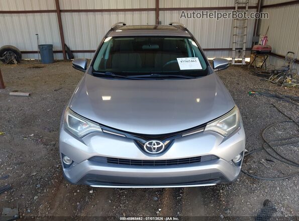 2T3RFREV9GW474615 2016 TOYOTA RAV4 Gray Rear interior view