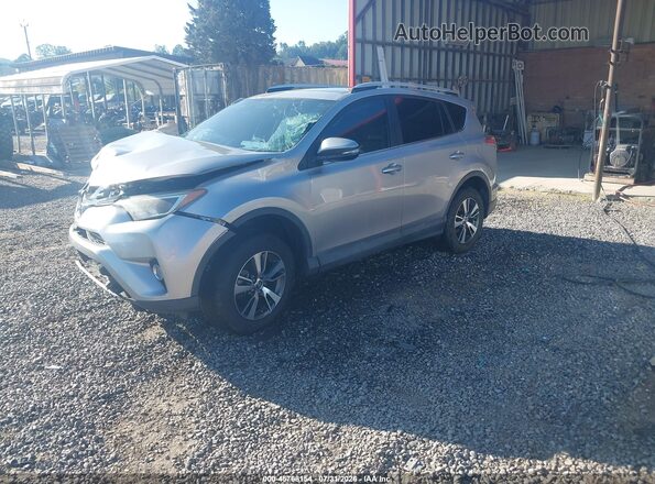 2T3RFREV9GW482732 2016 TOYOTA RAV4 Silver Vista tres cuartos delantera izquierda