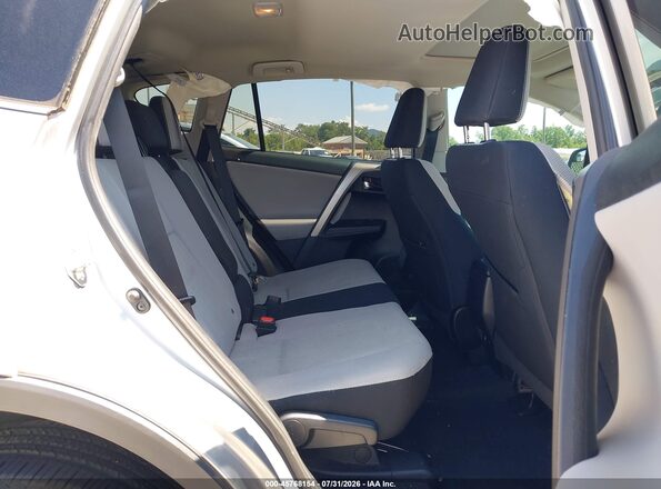 2T3RFREV9GW482732 2016 TOYOTA RAV4 Silver Vista de la etiqueta del VIN