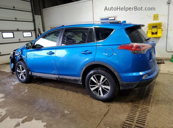 2T3RFREV9HW552263 2017 TOYOTA RAV4 Blue Trasero izquierdo