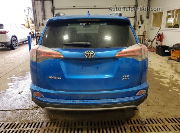 2T3RFREV9HW552263 2017 TOYOTA RAV4 Blue Vista trasera