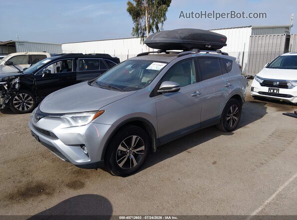 2T3RFREV9HW643260 2017 TOYOTA RAV4 Silver Առջևի ձախ երեք քառորդ տեսարան