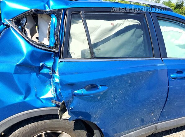 2T3RFREV9JW748158 2018 TOYOTA RAV4 Blue უკანა სალონის ხედი