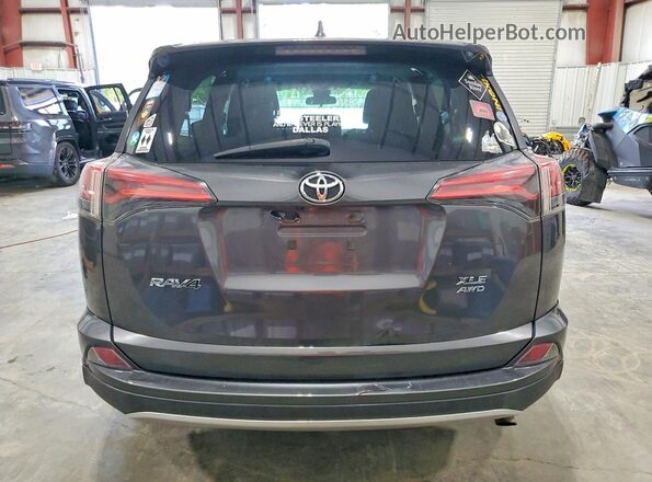2T3RFREV9JW801943 2018 TOYOTA RAV4 Charcoal უკანა ხედი