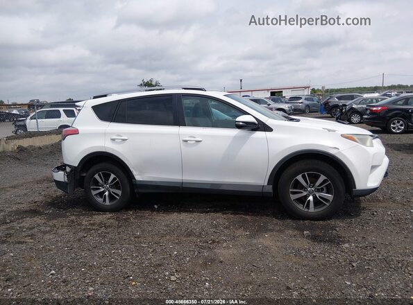 2T3RFREVSHW612944 2017 TOYOTA RAV4 White Սալոնի հետևի տեսք