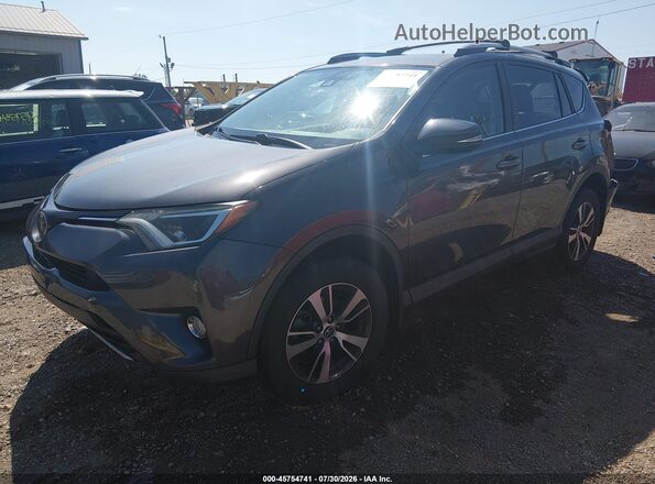2T3RFREVXHW557004 2017 TOYOTA RAV4 Gray Передня ліва чверть