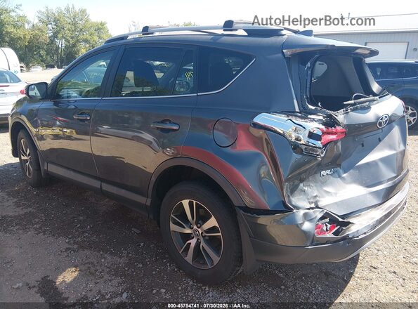 2T3RFREVXHW557004 2017 TOYOTA RAV4 Gray Вид спереду