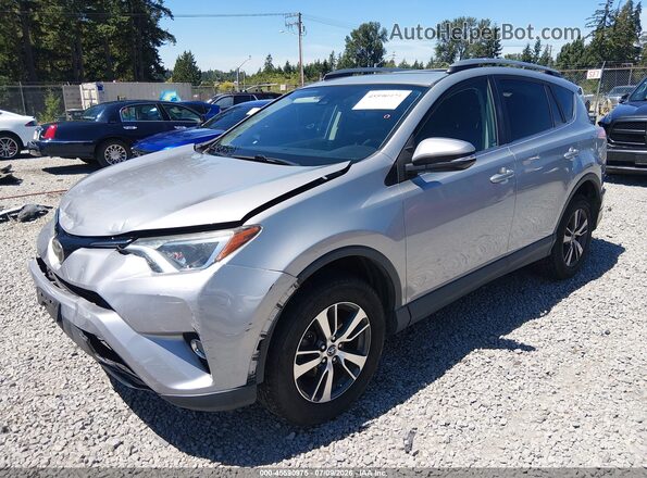 2T3RFREVXHW574255 2017 TOYOTA RAV4 Silver Vista tres cuartos delantera izquierda