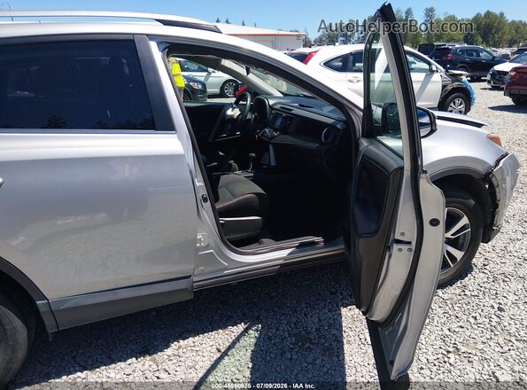2T3RFREVXHW574255 2017 TOYOTA RAV4 Silver Vista interior delantera