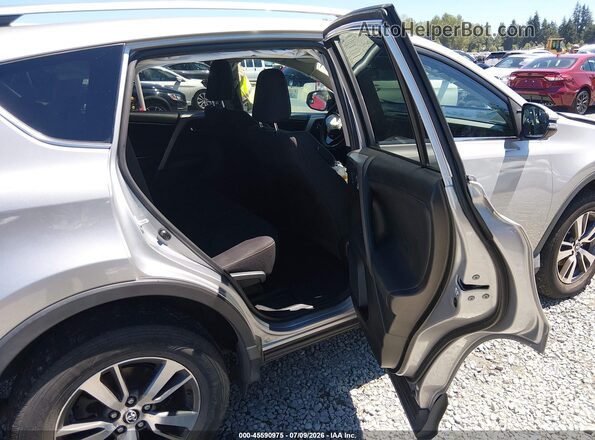 2T3RFREVXHW574255 2017 TOYOTA RAV4 Silver Vista de la etiqueta del VIN