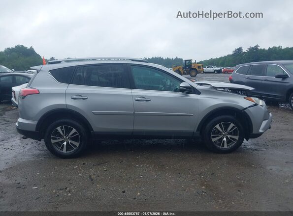 2T3RFREVXHW591363 2017 TOYOTA RAV4 Silver უკანა სალონის ხედი