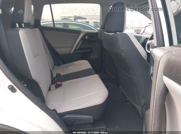 2T3RFREVXHW693648 2017 TOYOTA RAV4 White VIN კოდის სტიკერის ხედი