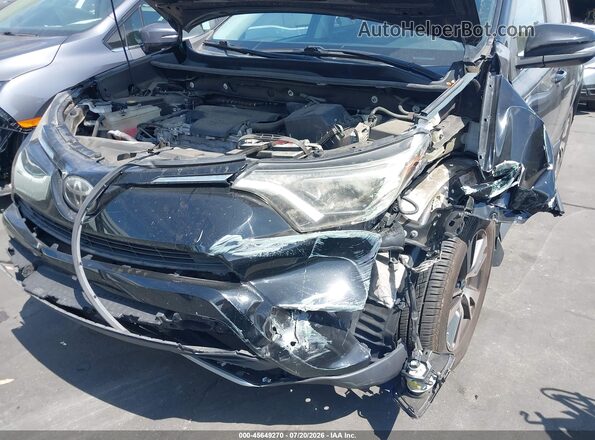 2T3RFREVXJW809842 2018 TOYOTA RAV4 Черный Вид спереди
