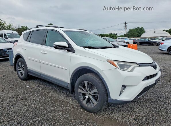 2T3RFREVXJW811266 2018 TOYOTA RAV4 White Front right