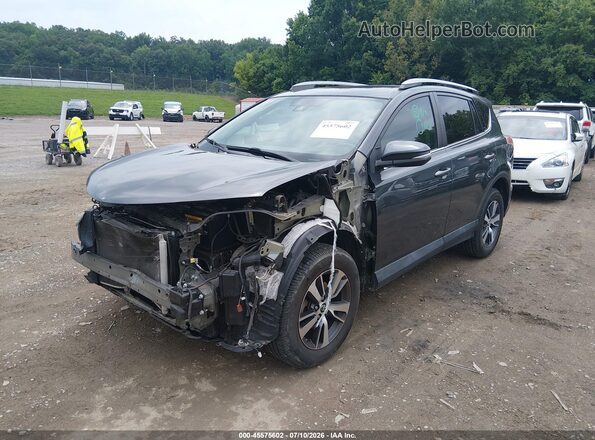 2T3RFREVXJW844137 2018 TOYOTA RAV4 Silver Vista tres cuartos delantera izquierda