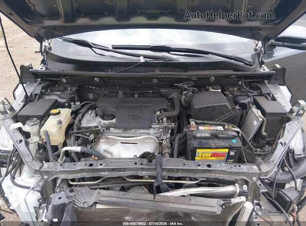 2T3RFREVXJW844137 2018 TOYOTA RAV4 Silver Vista trasera