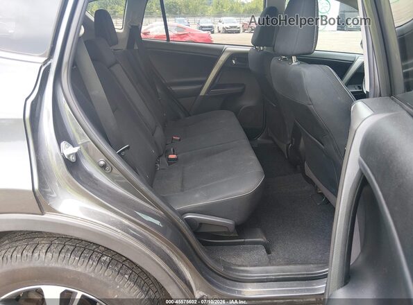 2T3RFREVXJW844137 2018 TOYOTA RAV4 Silver Vista de la etiqueta del VIN