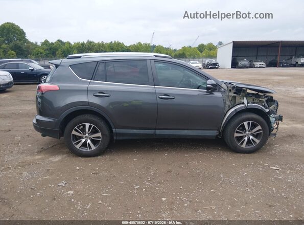 2T3RFREVXJW844137 2018 TOYOTA RAV4 Silver Vista interior trasera
