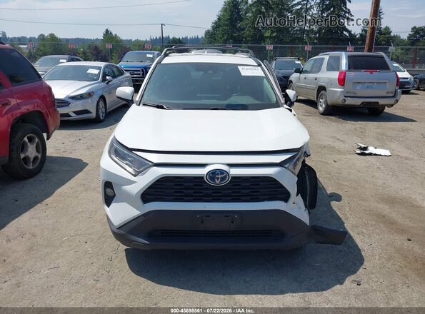 2T3RWRFV1LW093687 2020 TOYOTA RAV4 HYBRID White Widok wnętrza z tyłu