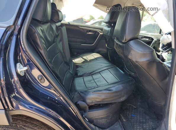 2T3RWRFV2KW002148 2019 TOYOTA RAV4 Blue Rear interior view