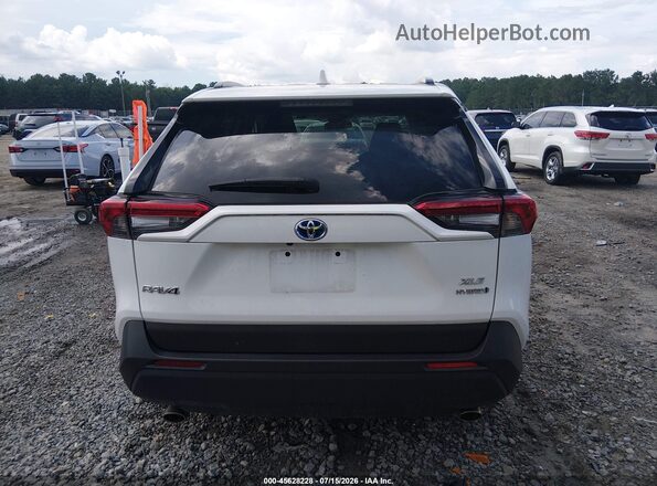 2T3RWRFV2NW135707 2022 TOYOTA RAV4 HYBRID White 